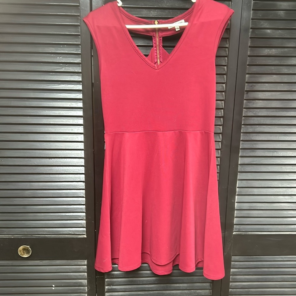 Short women’s dress with cross back design